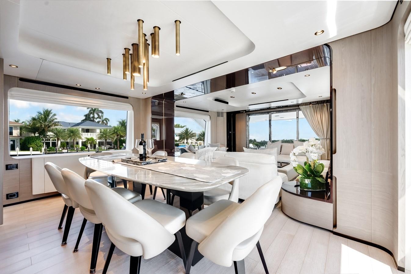 a dining room with a large table aboard DAYBREAK Yacht for Sale