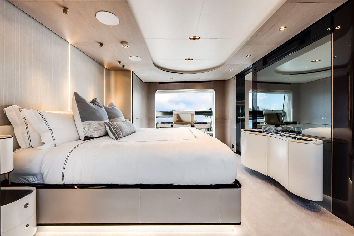 a bedroom with a large bed aboard DAYBREAK Yacht for Sale