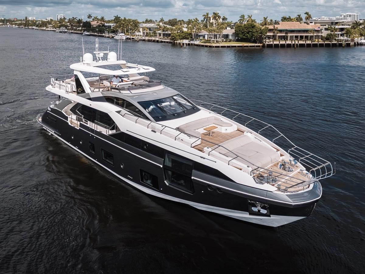 a white yacht on the water aboard DAYBREAK Yacht for Sale