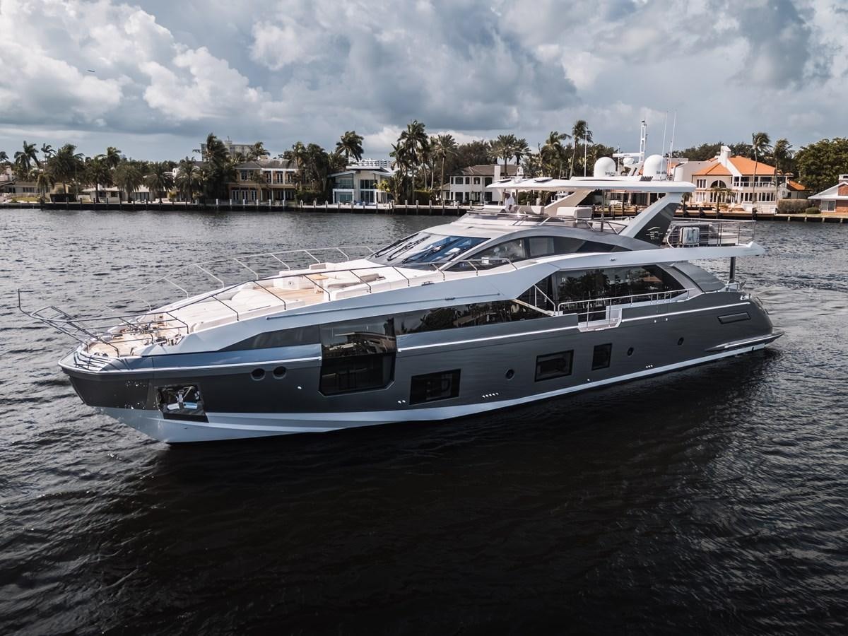 a white yacht in the water aboard DAYBREAK Yacht for Sale
