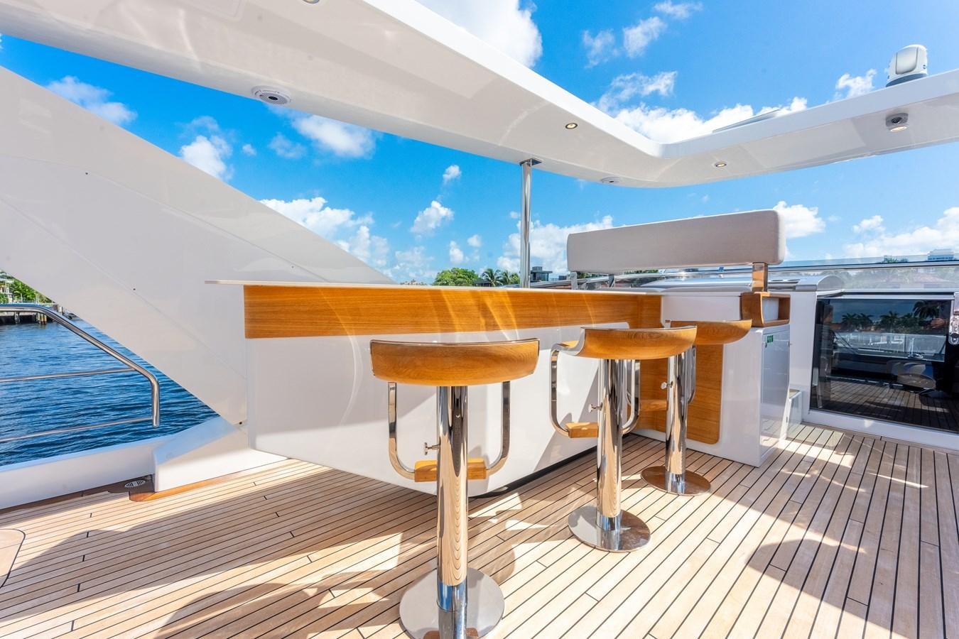 a table on a deck aboard DAYBREAK Yacht for Sale