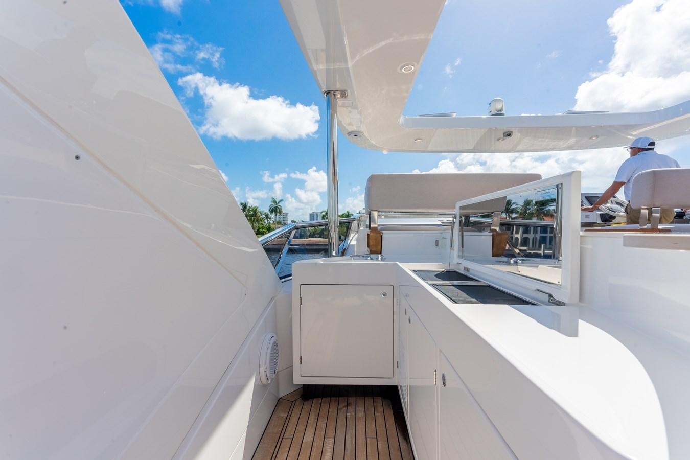 a person sitting on a boat aboard DAYBREAK Yacht for Sale
