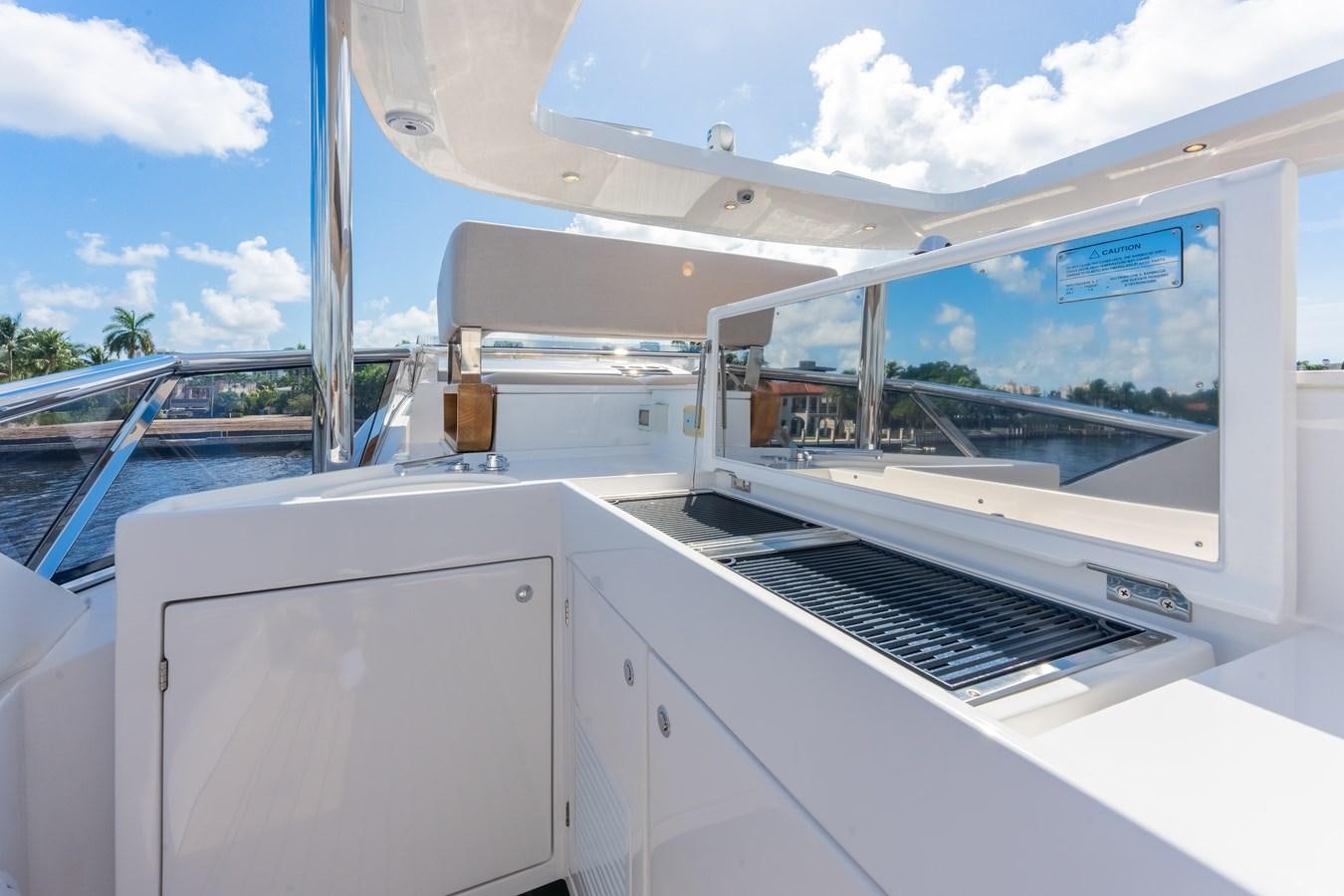 a boat with a large window aboard DAYBREAK Yacht for Sale