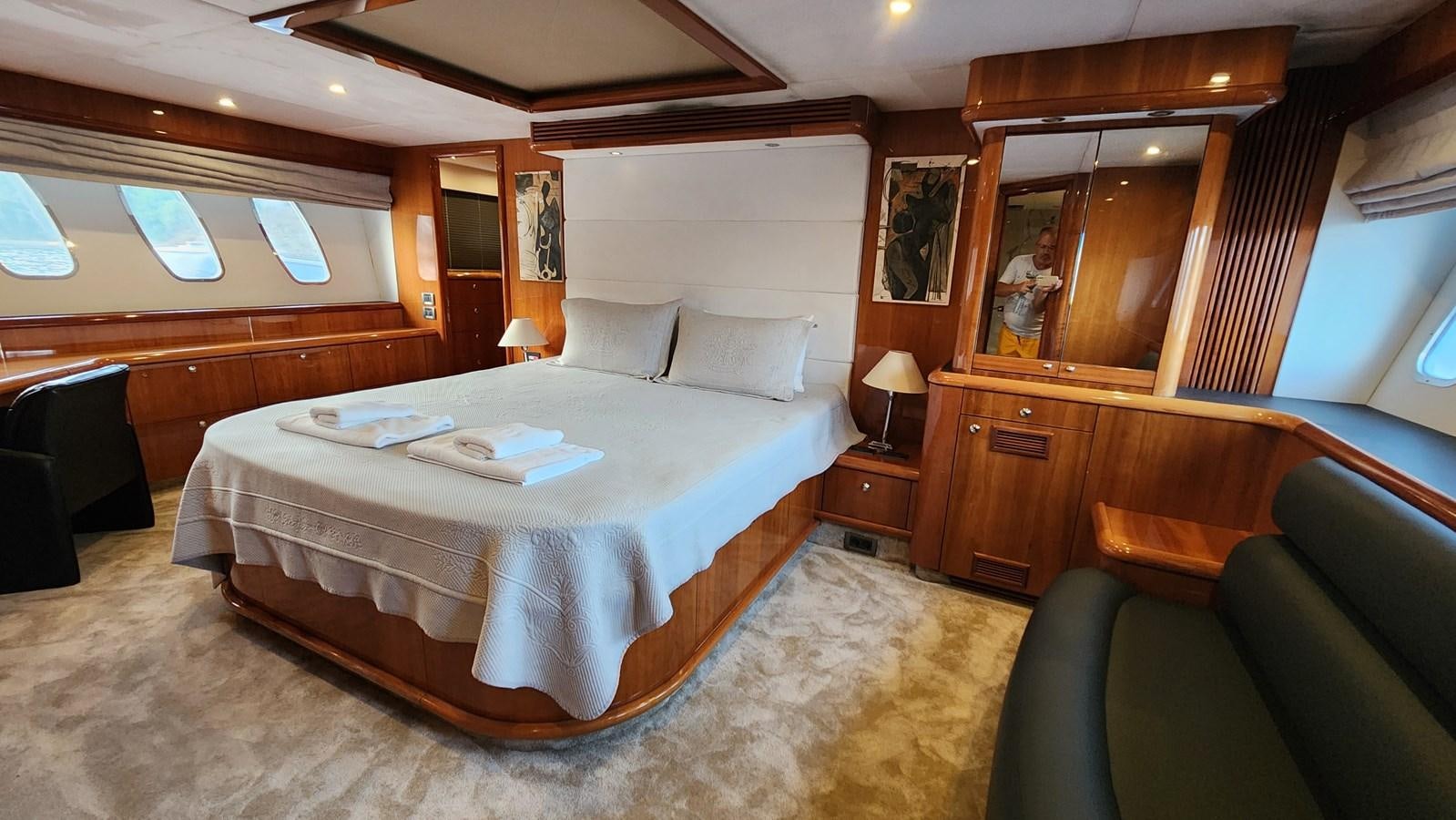 a large bed in a room aboard SPACE ODDITY Yacht for Sale