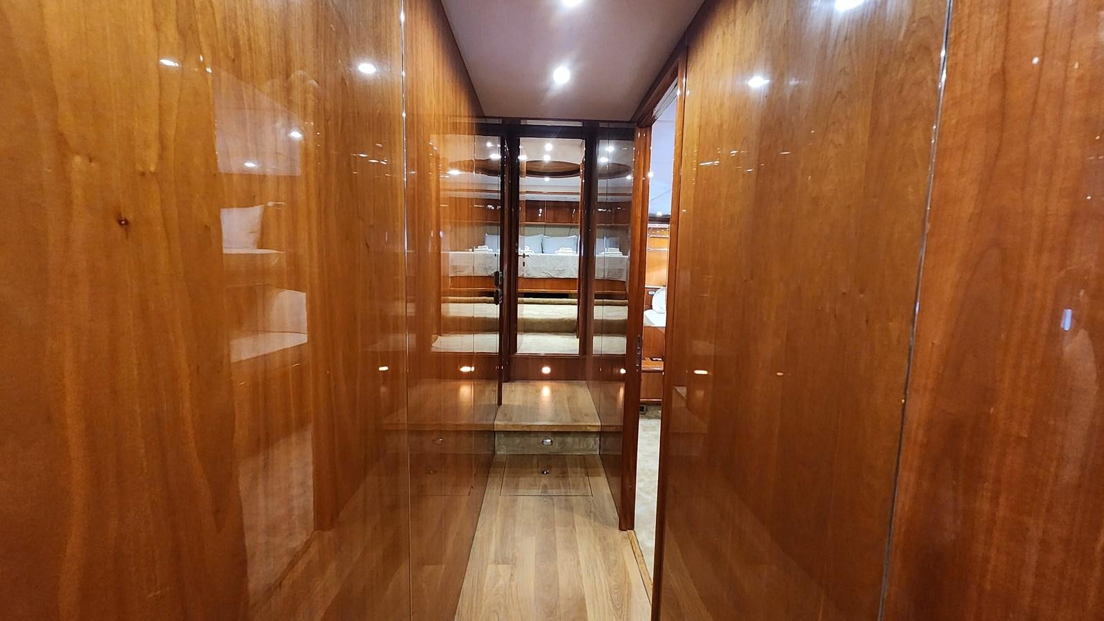 a hallway with wooden walls aboard SPACE ODDITY Yacht for Sale