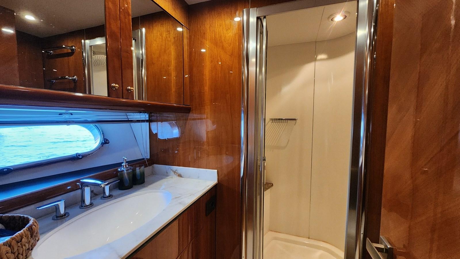 a bathroom with a large jacuzzi tub aboard SPACE ODDITY Yacht for Sale