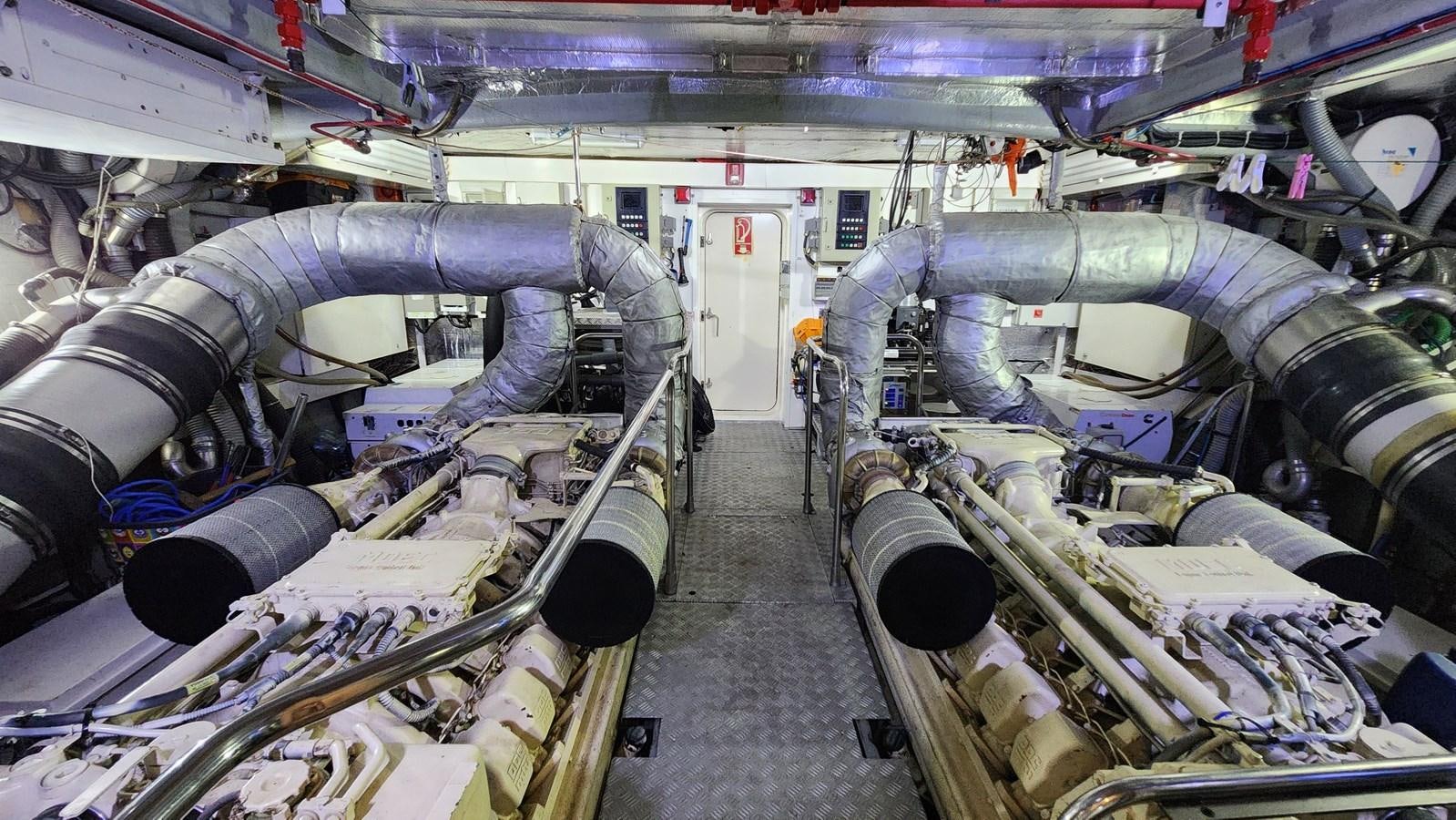 a large machine with many metal parts aboard SPACE ODDITY Yacht for Sale