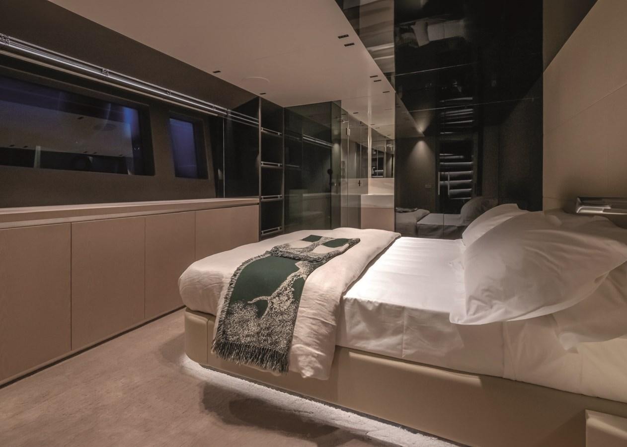a bed in a room aboard NADA Yacht for Sale