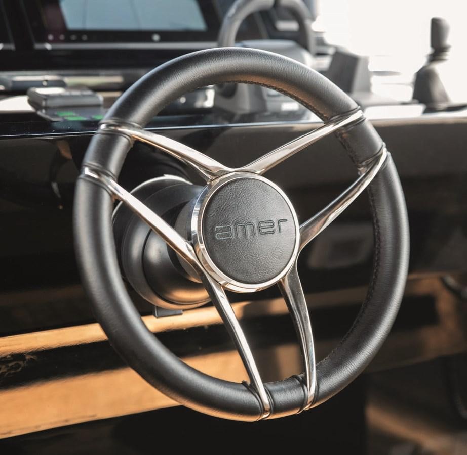 a pair of headphones on a desk aboard NADA Yacht for Sale
