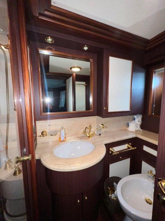 a bathroom with a sink and a mirror aboard MYEERAH Yacht for Sale