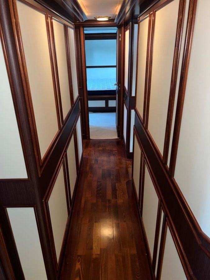 a hallway with a wood floor aboard MYEERAH Yacht for Sale