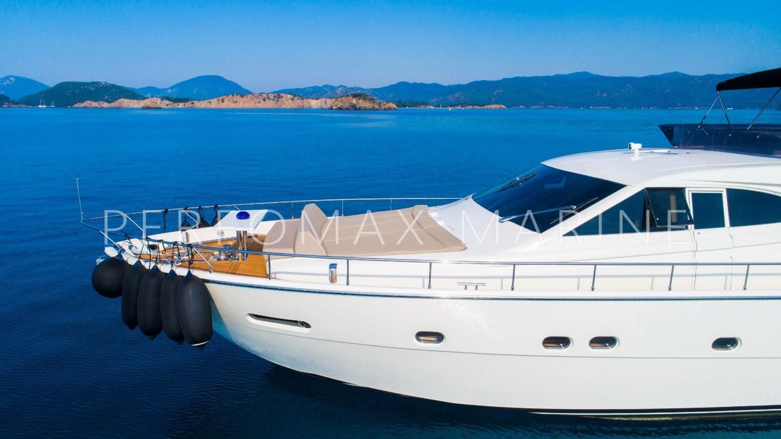 a white boat on a body of water aboard F78 Yacht for Sale