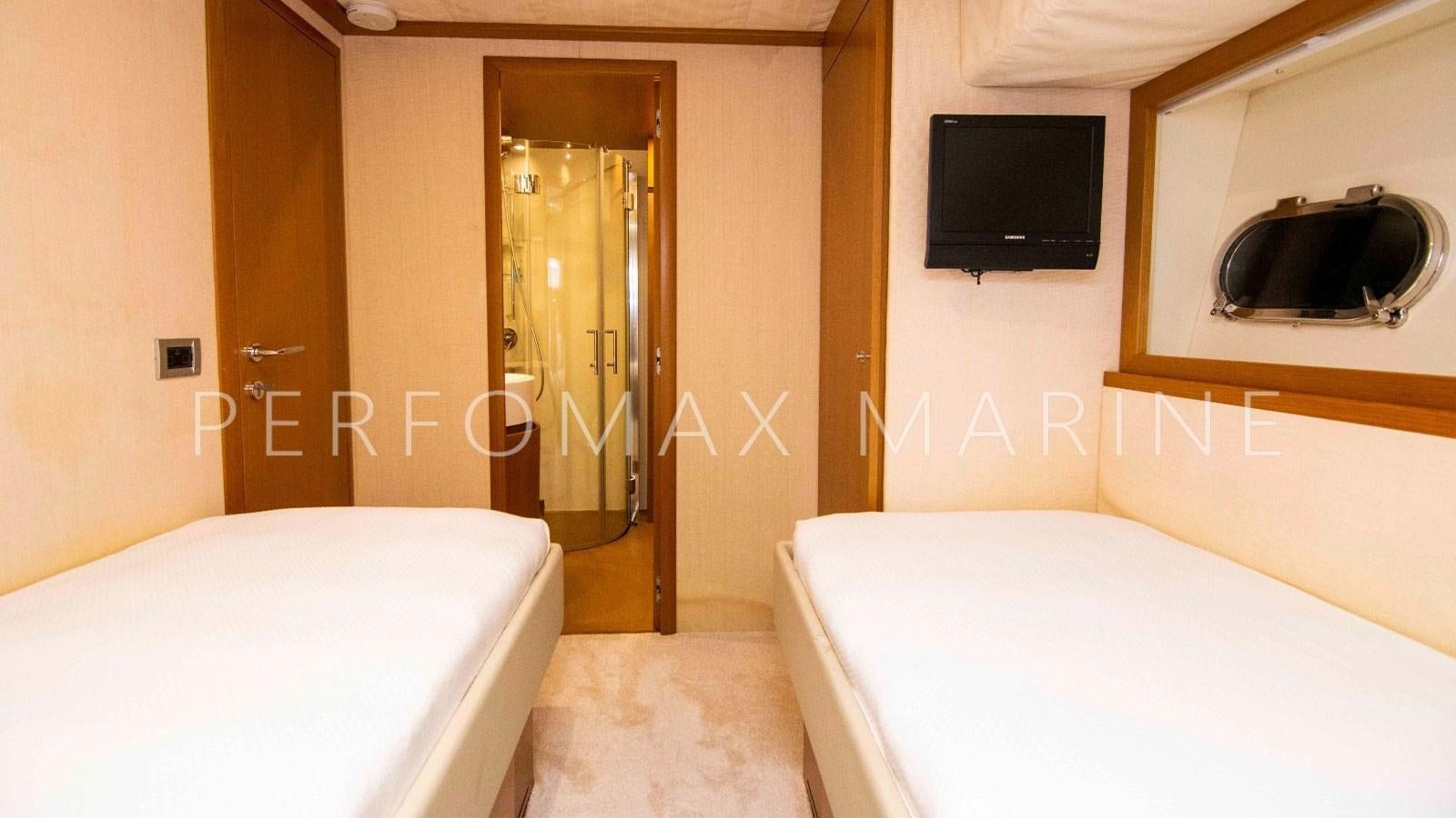 a bathroom with a bathtub and a television aboard F78 Yacht for Sale