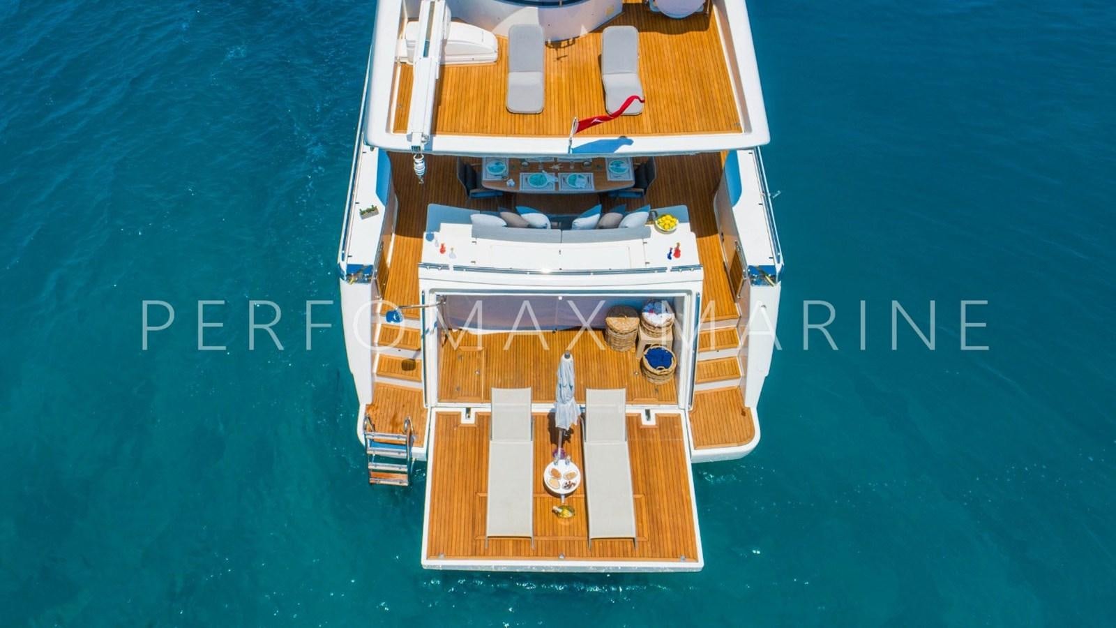 a small wooden boat aboard F78 Yacht for Sale