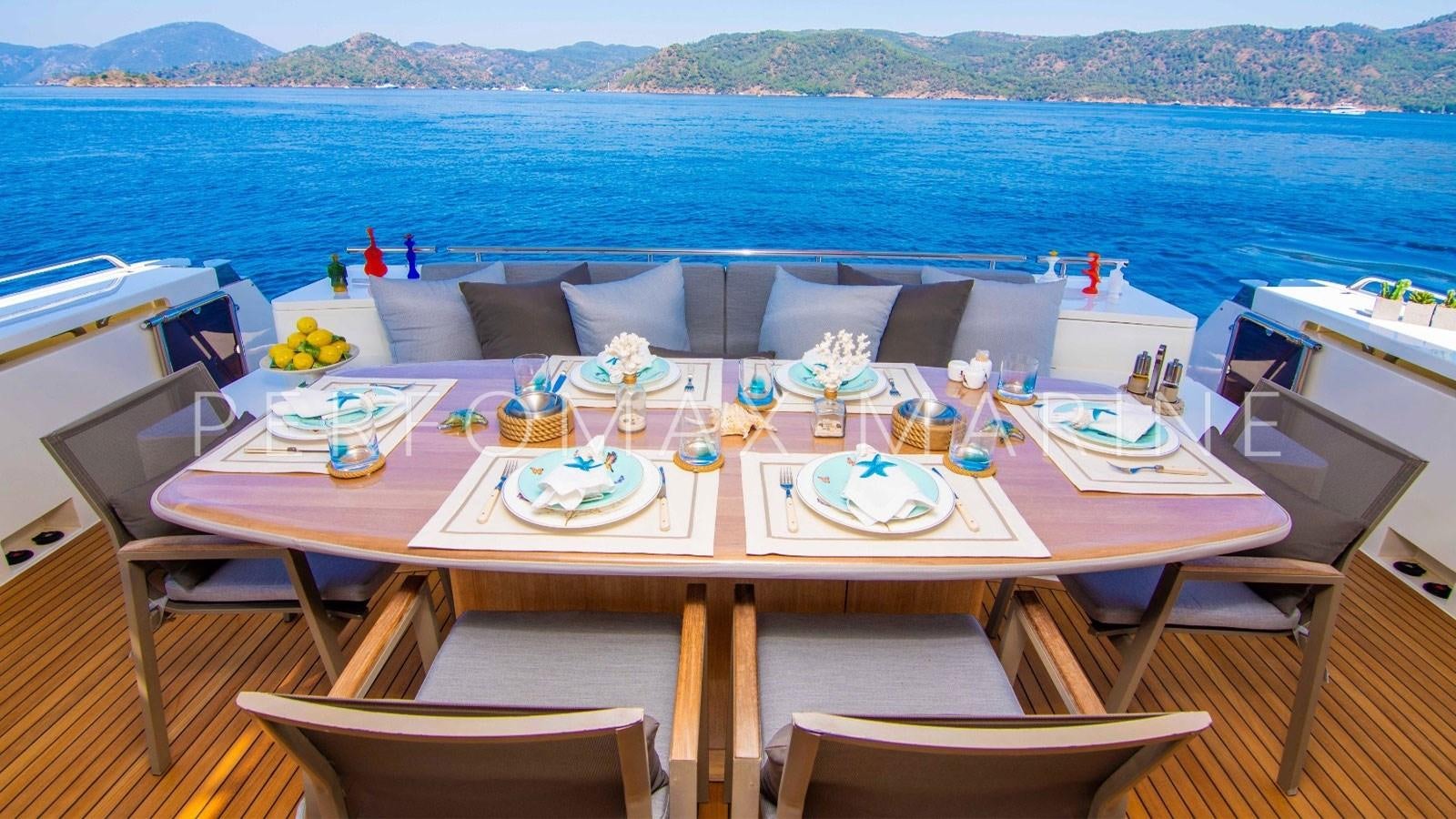 a table set for a dinner party aboard F78 Yacht for Sale