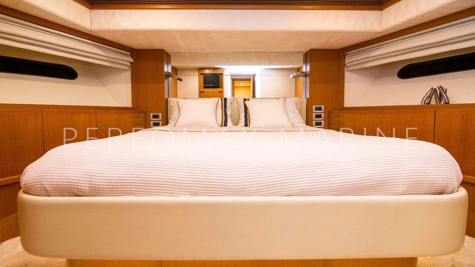a large bed with white sheets aboard F78 Yacht for Sale