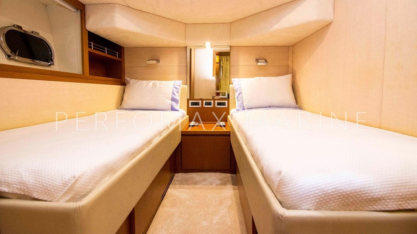 a room with two beds aboard F78 Yacht for Sale