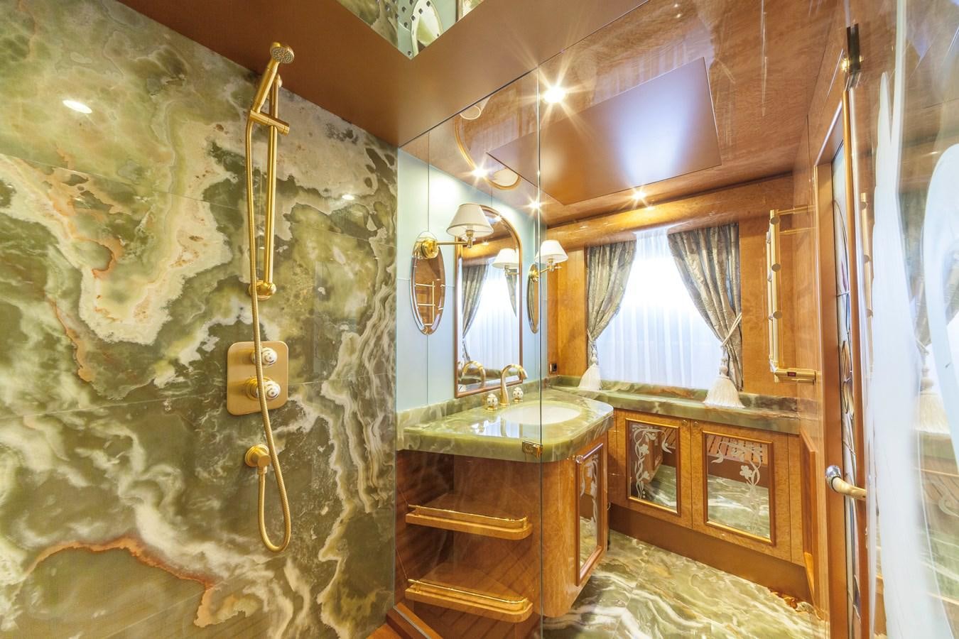 a bathroom with a large wallpaper aboard DUCHESSA Yacht for Sale