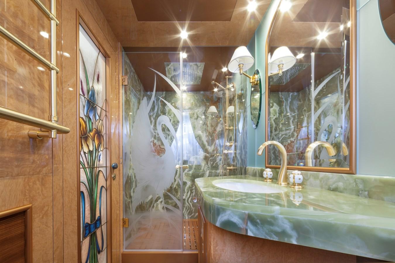 a bathroom with a large marble counter aboard DUCHESSA Yacht for Sale