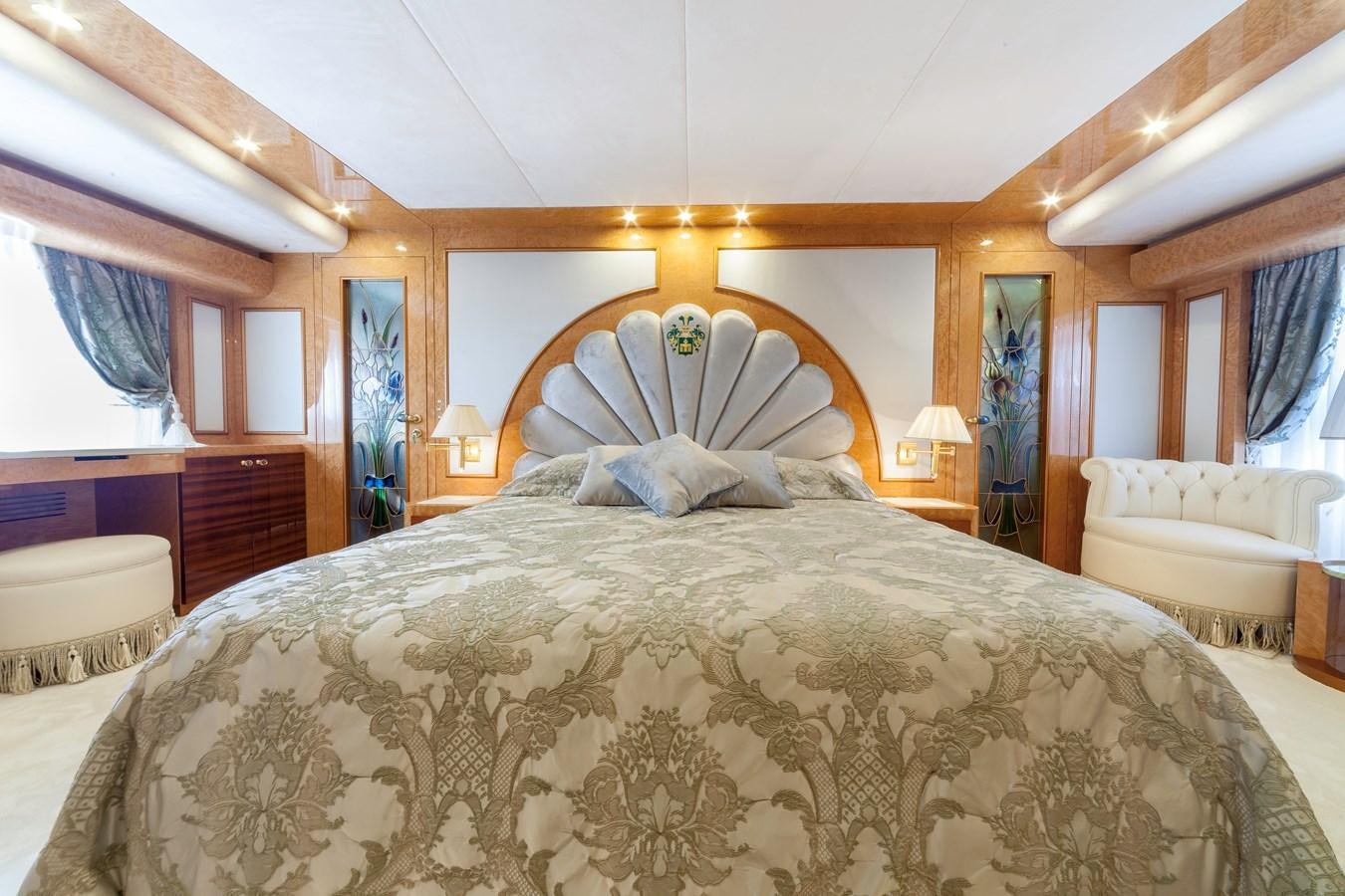 a bed with a canopy aboard DUCHESSA Yacht for Sale