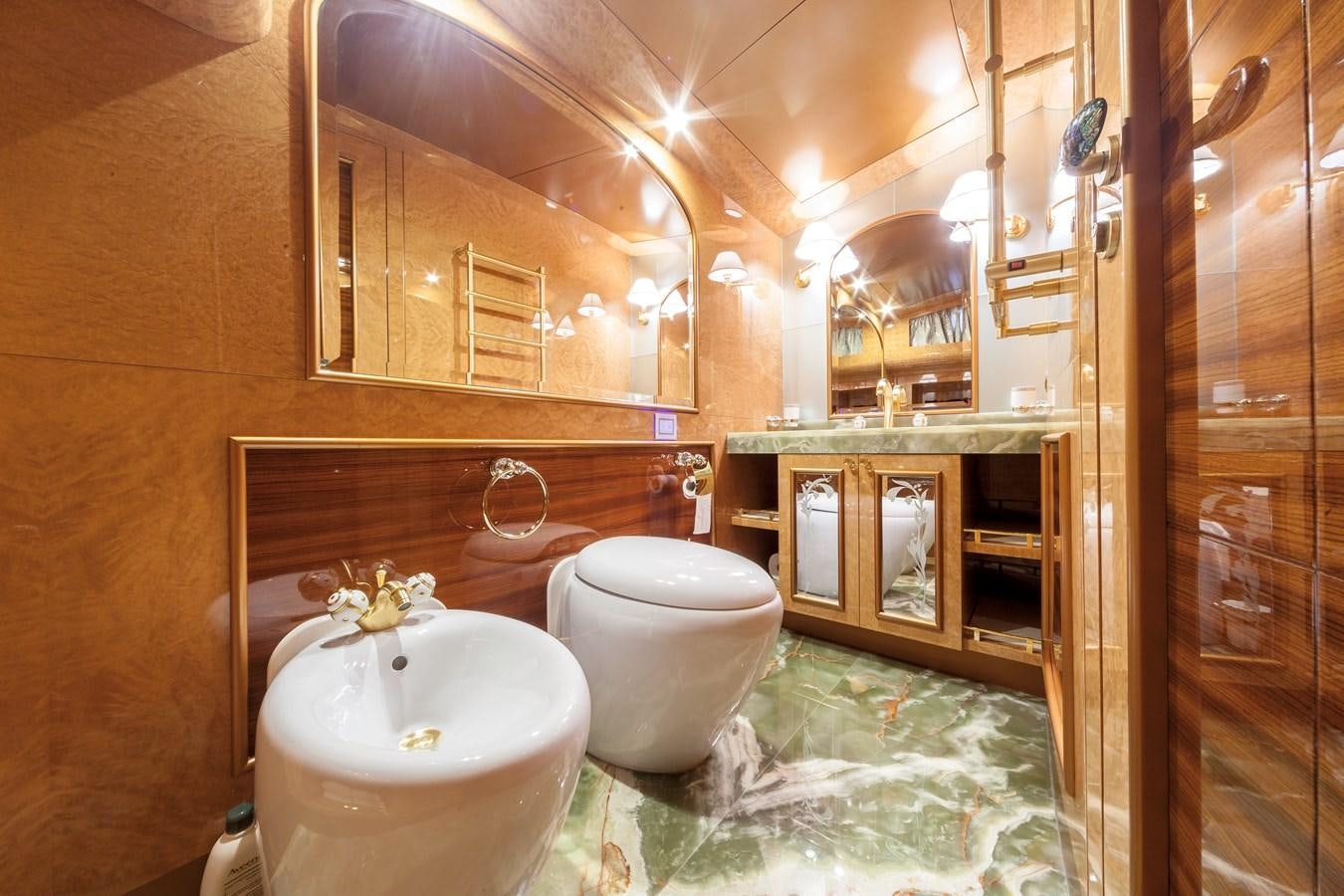 a bathroom with a sink and a toilet aboard DUCHESSA Yacht for Sale