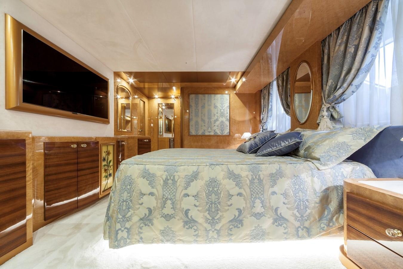 a large bed in a room aboard DUCHESSA Yacht for Sale