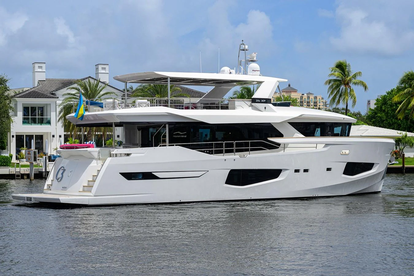 a white yacht in the water aboard C3 Yacht for Sale