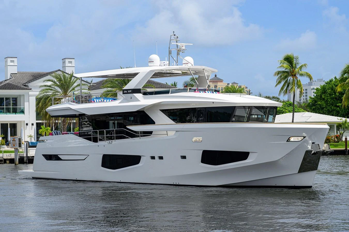 a white boat on the water aboard C3 Yacht for Sale