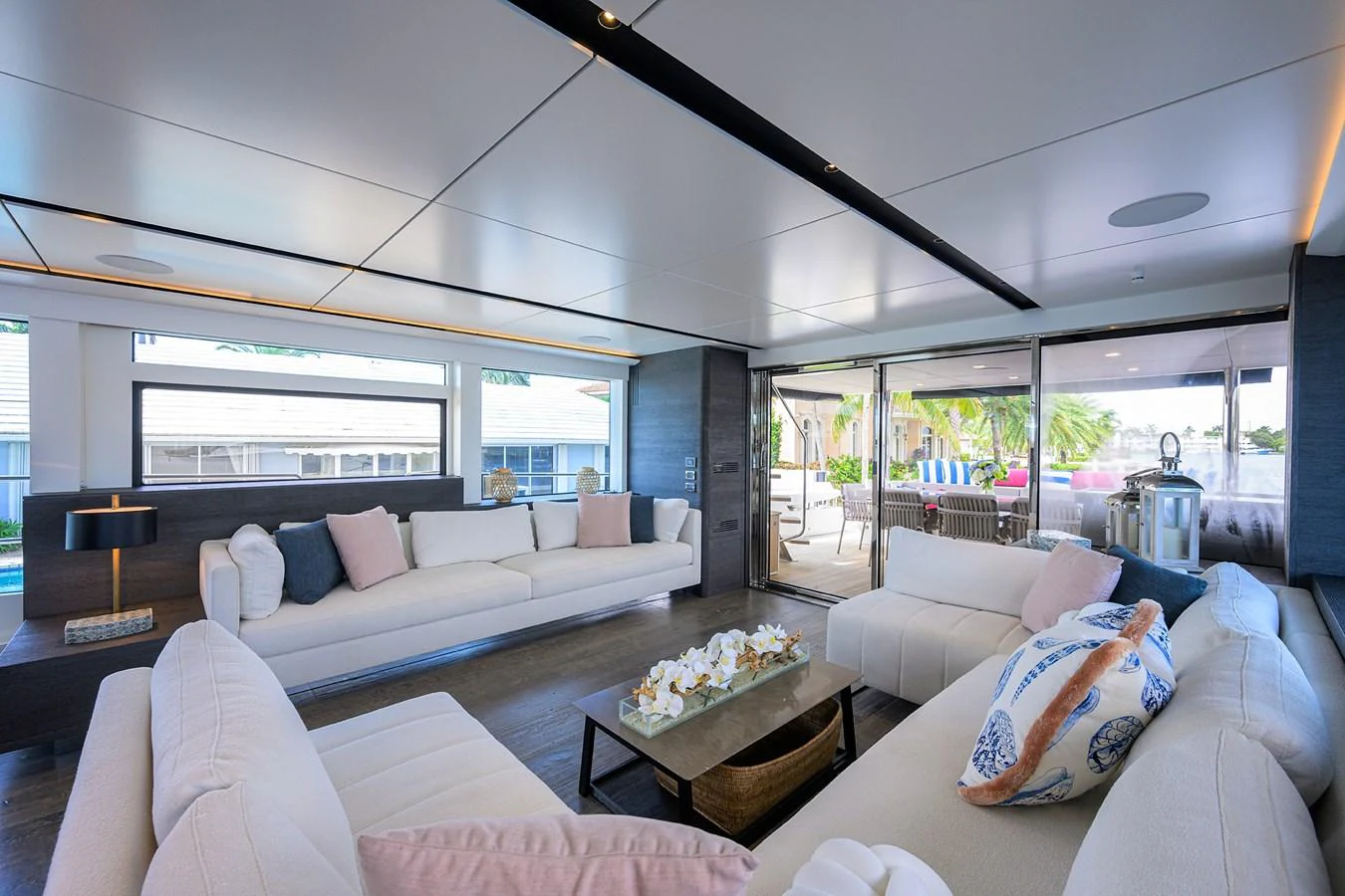 a living room with a large window aboard C3 Yacht for Sale