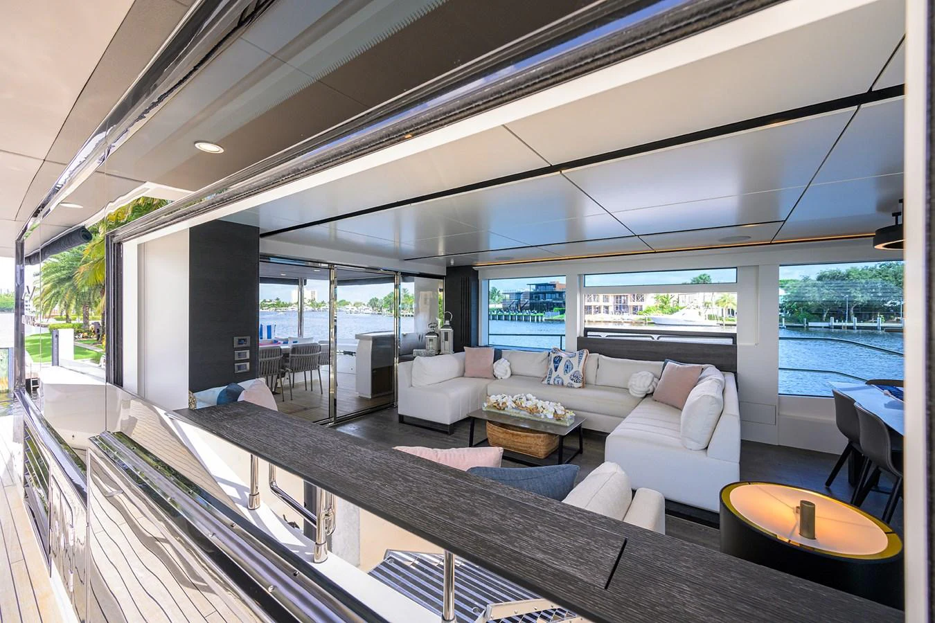 a living room with a large window aboard C3 Yacht for Sale