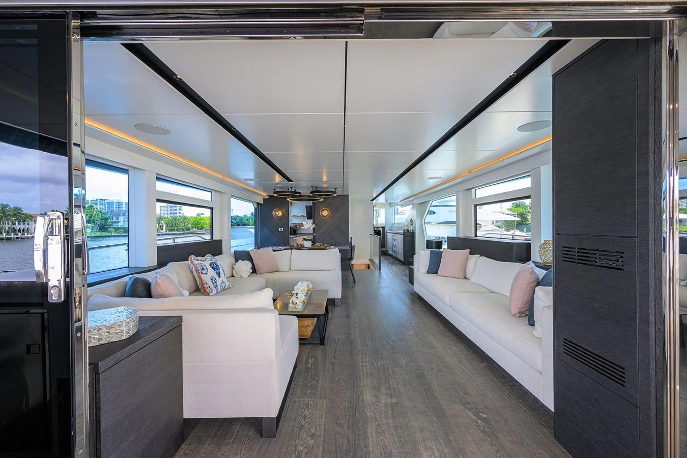 a room with a bed and a couch aboard C3 Yacht for Sale