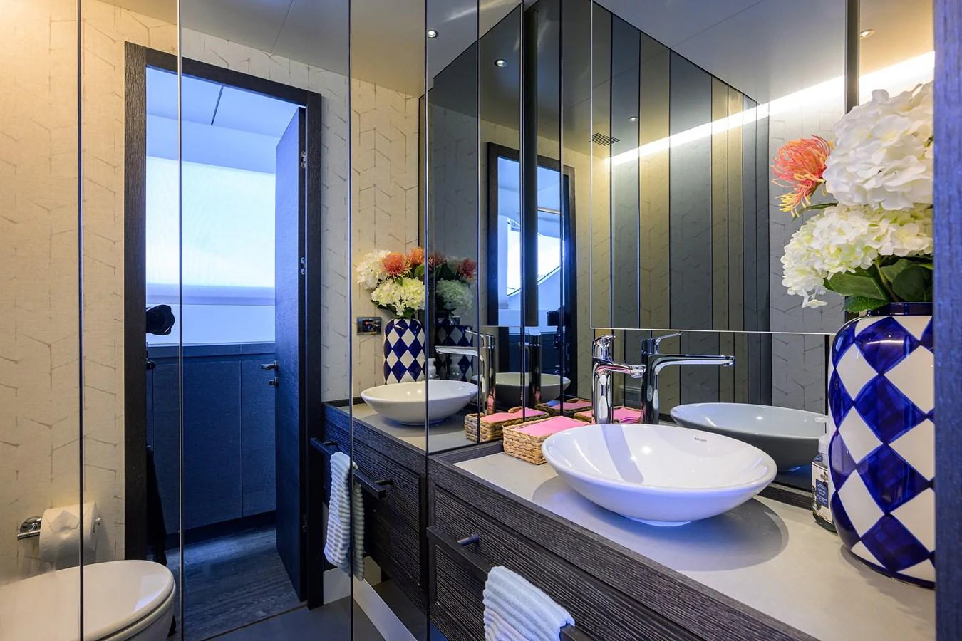 a bathroom with a sink and a mirror aboard C3 Yacht for Sale
