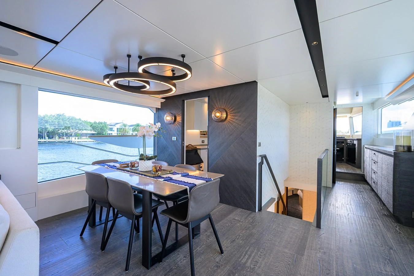 a dining table in a room aboard C3 Yacht for Sale