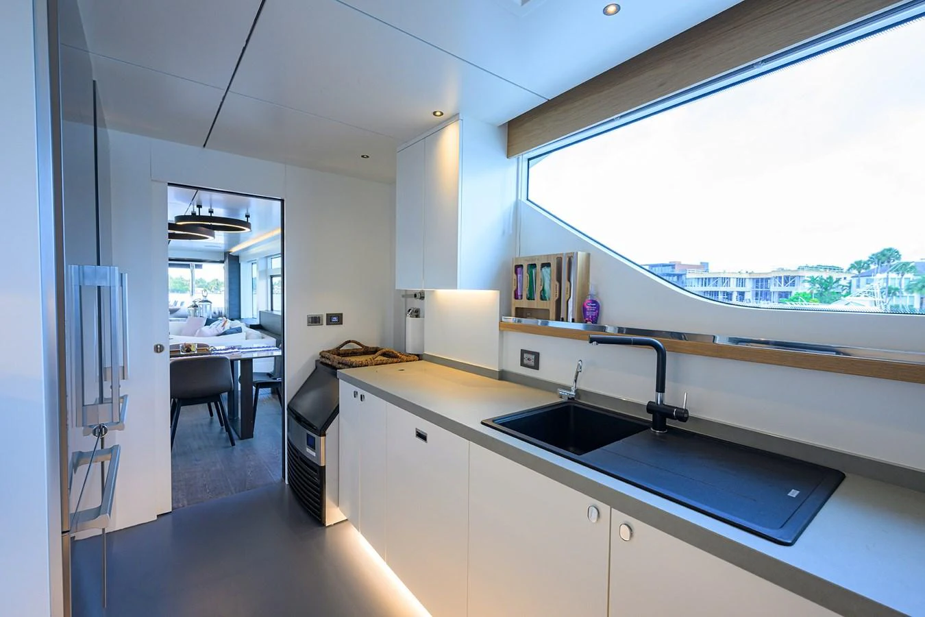 a kitchen with a large window aboard C3 Yacht for Sale