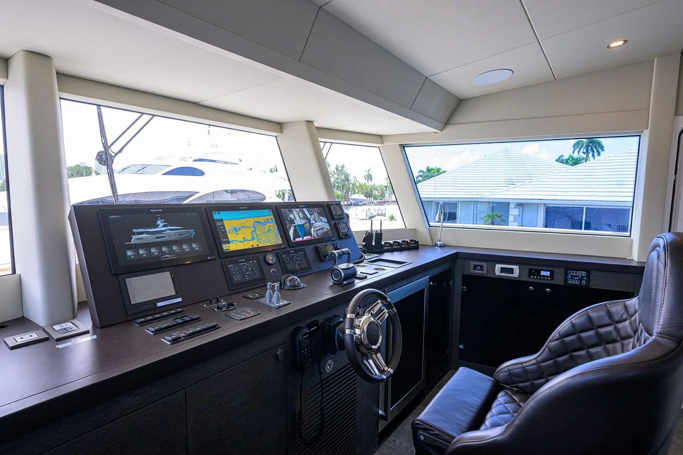 inside of a vehicle with monitors and controls aboard C3 Yacht for Sale