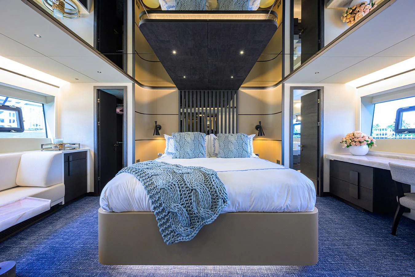 a room with a bed and a table aboard C3 Yacht for Sale