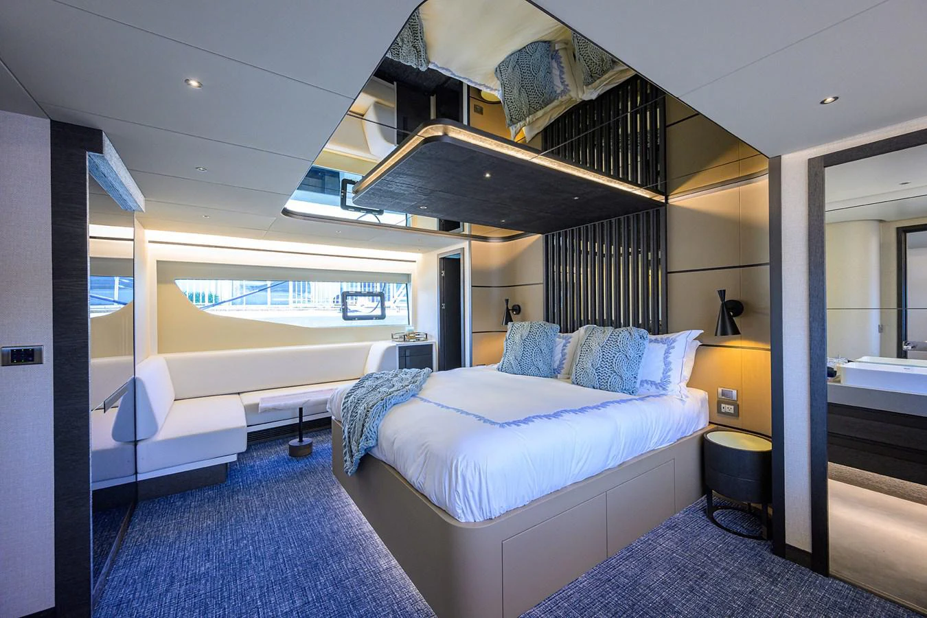 a room with a bed and a table aboard C3 Yacht for Sale