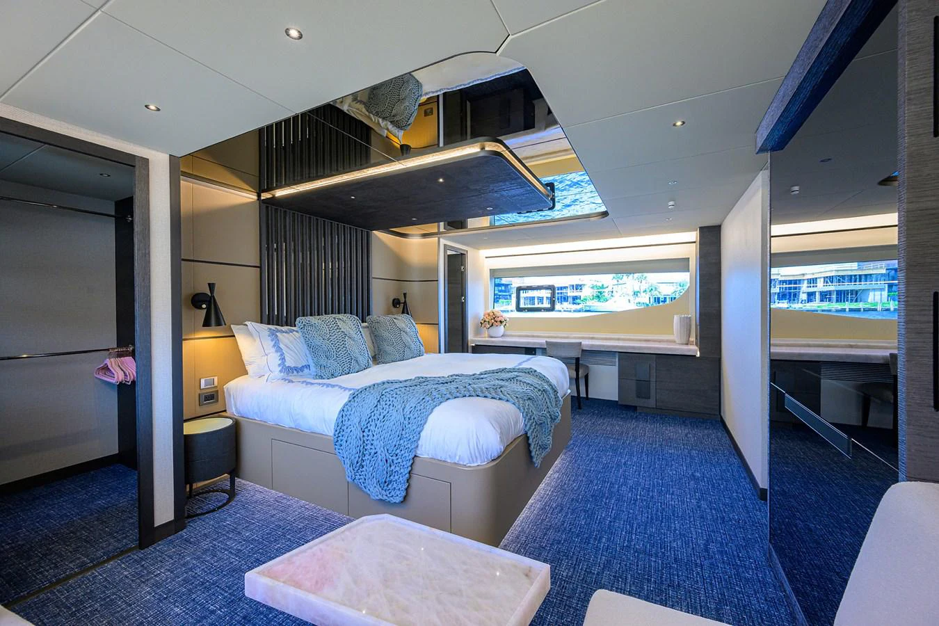 a room with a bed and a window aboard C3 Yacht for Sale