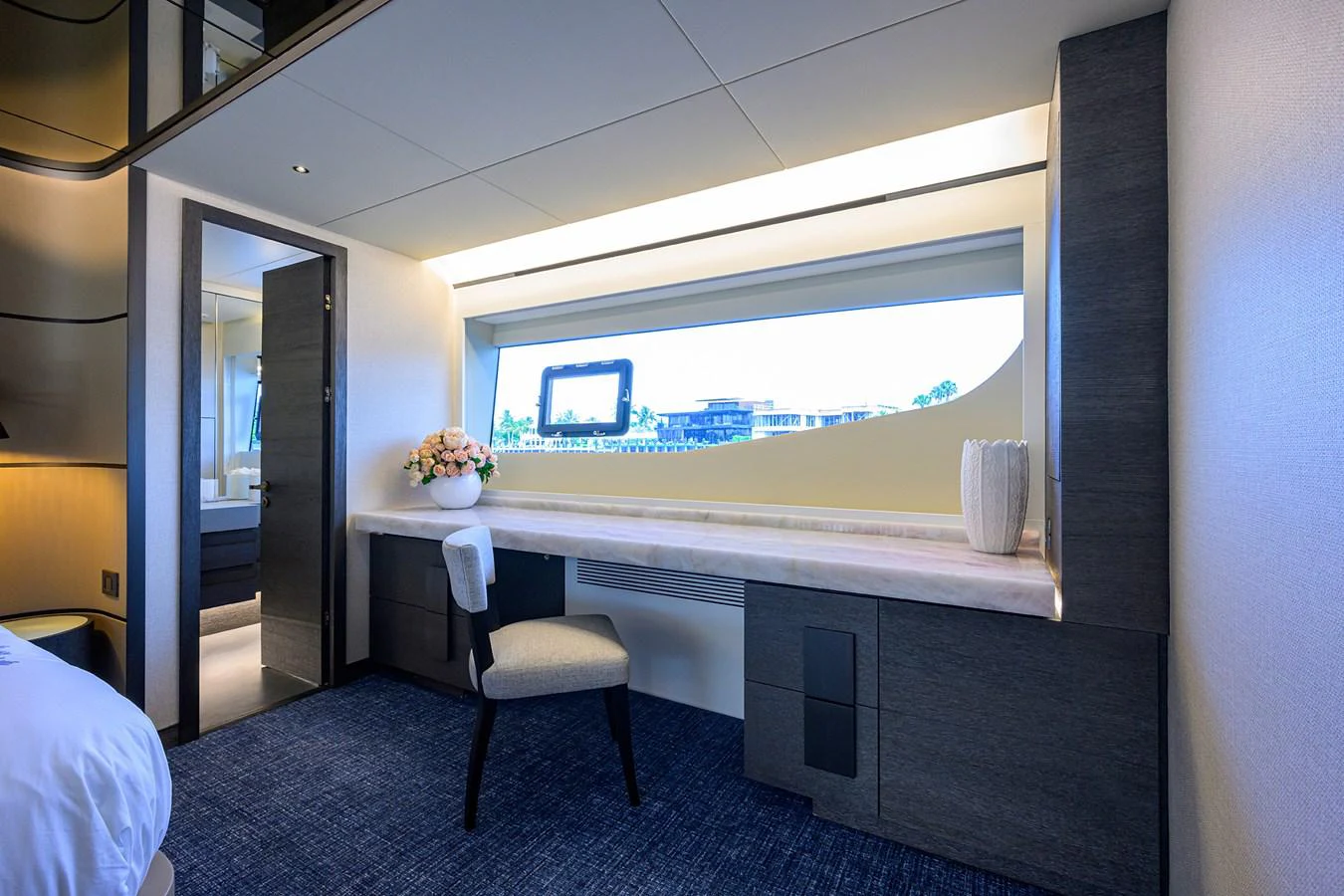 a room with a large window aboard C3 Yacht for Sale