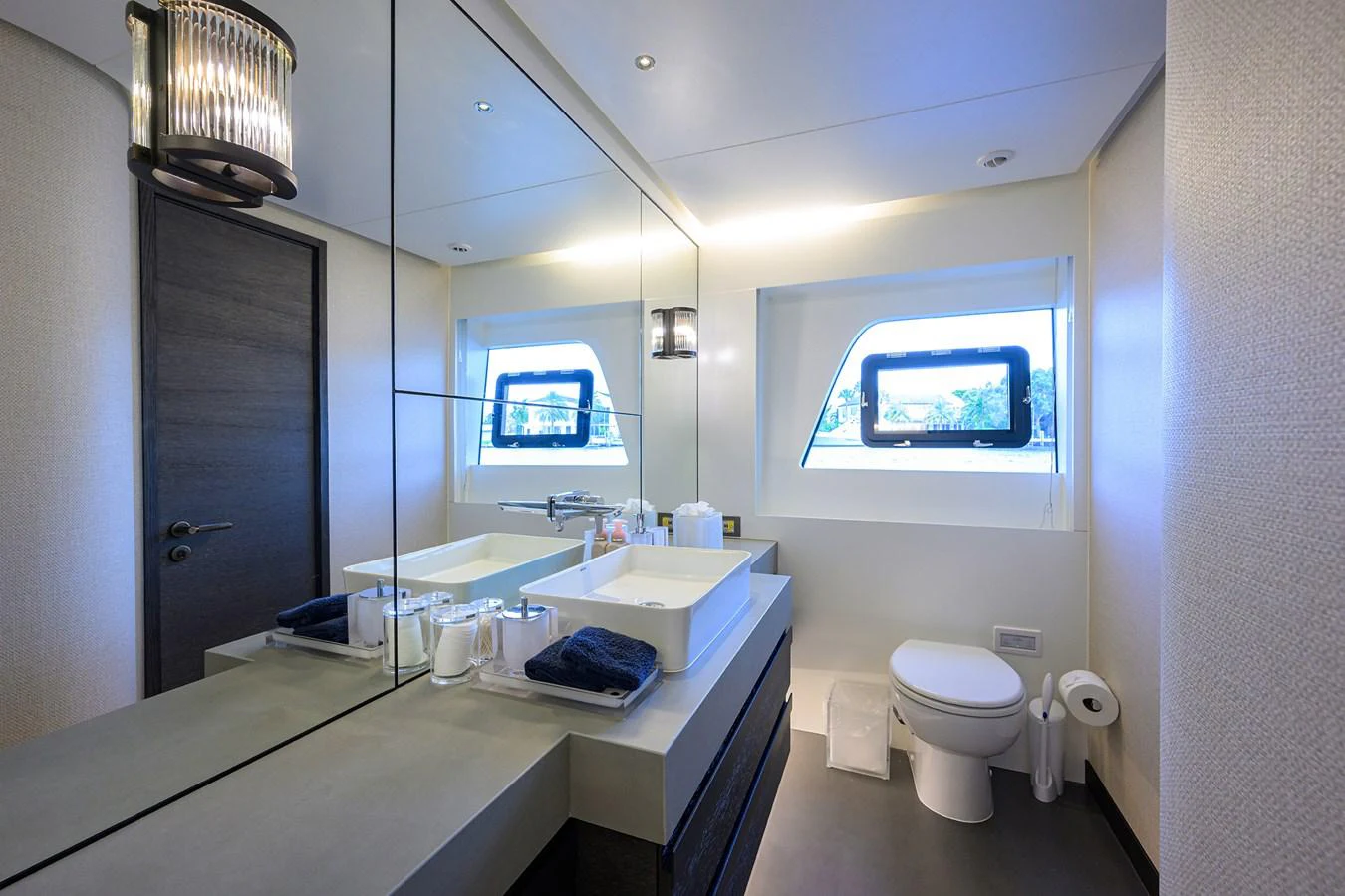 a bathroom with a large mirror aboard C3 Yacht for Sale