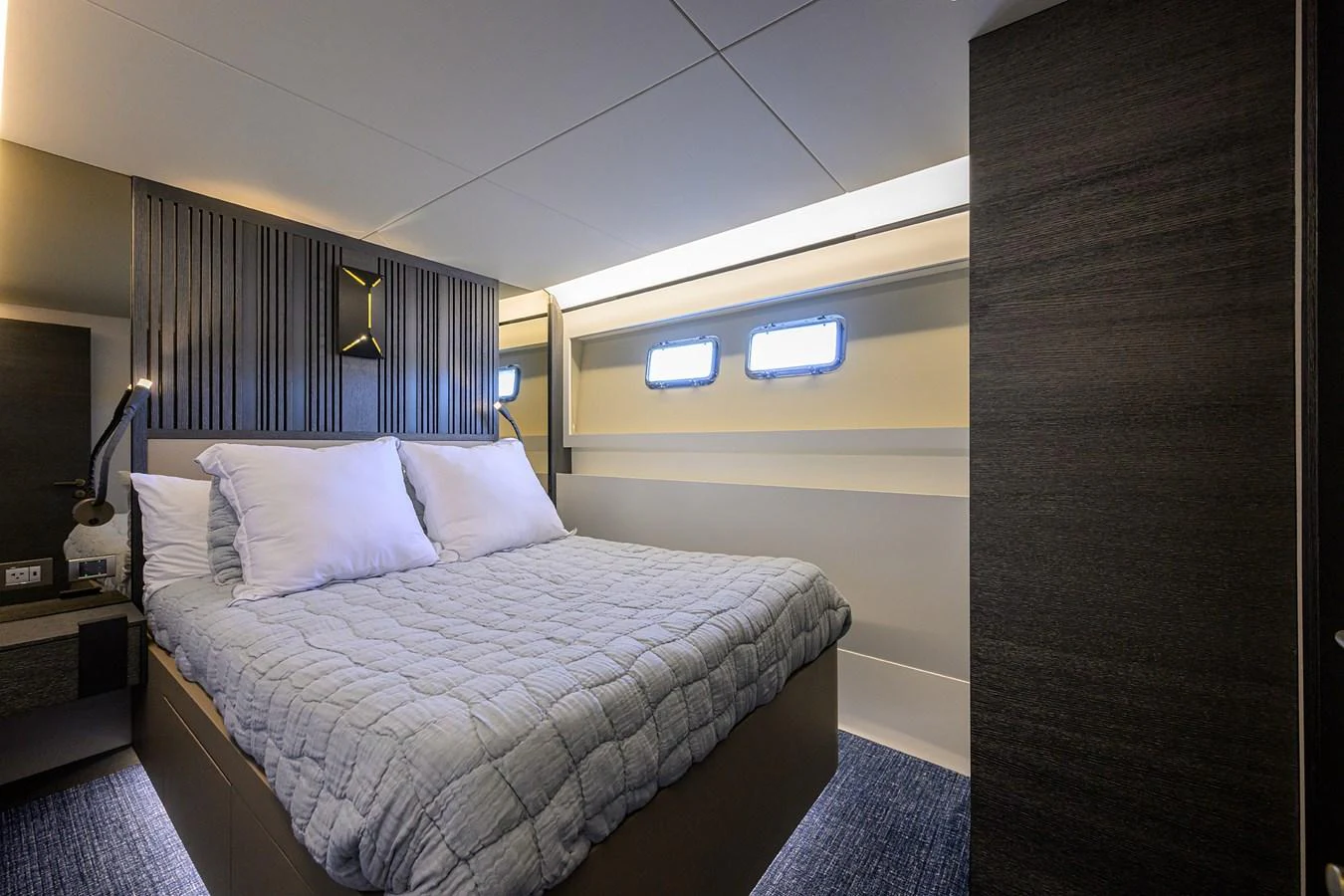 a bed in a room aboard C3 Yacht for Sale