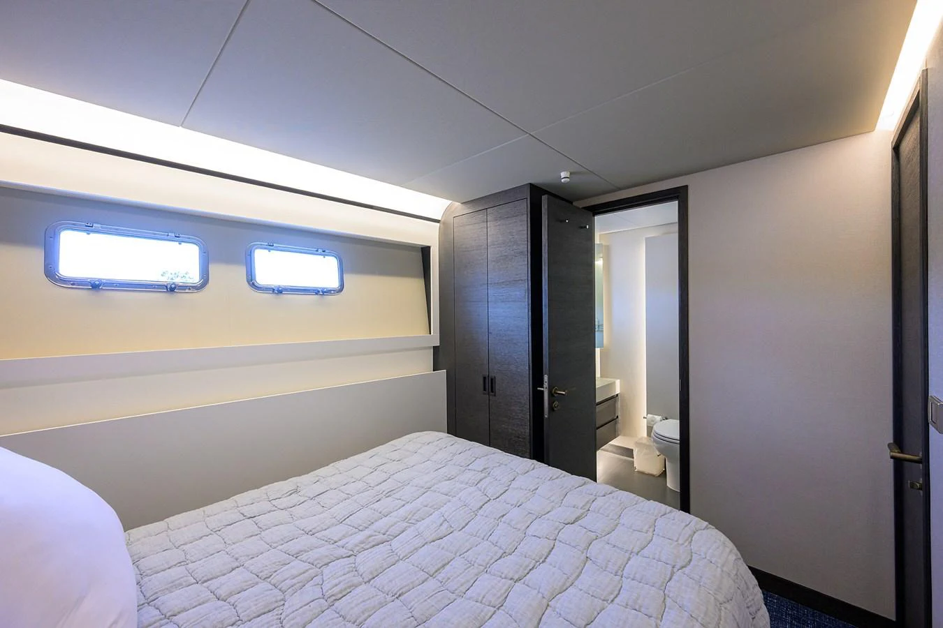a bed in a room aboard C3 Yacht for Sale