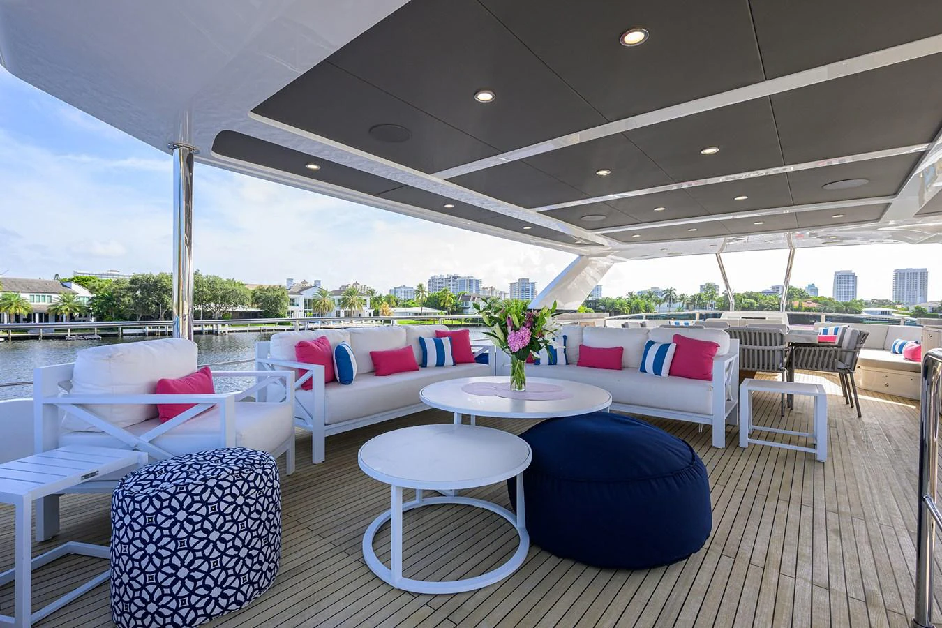 a large room with a table and chairs and a large window aboard C3 Yacht for Sale