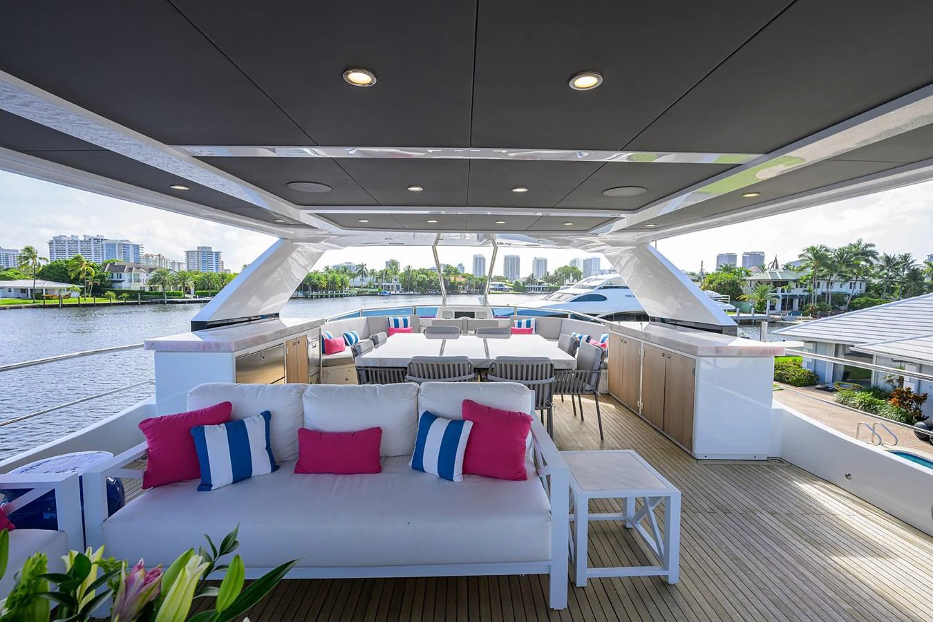 a room with a bed and a table and chairs aboard C3 Yacht for Sale