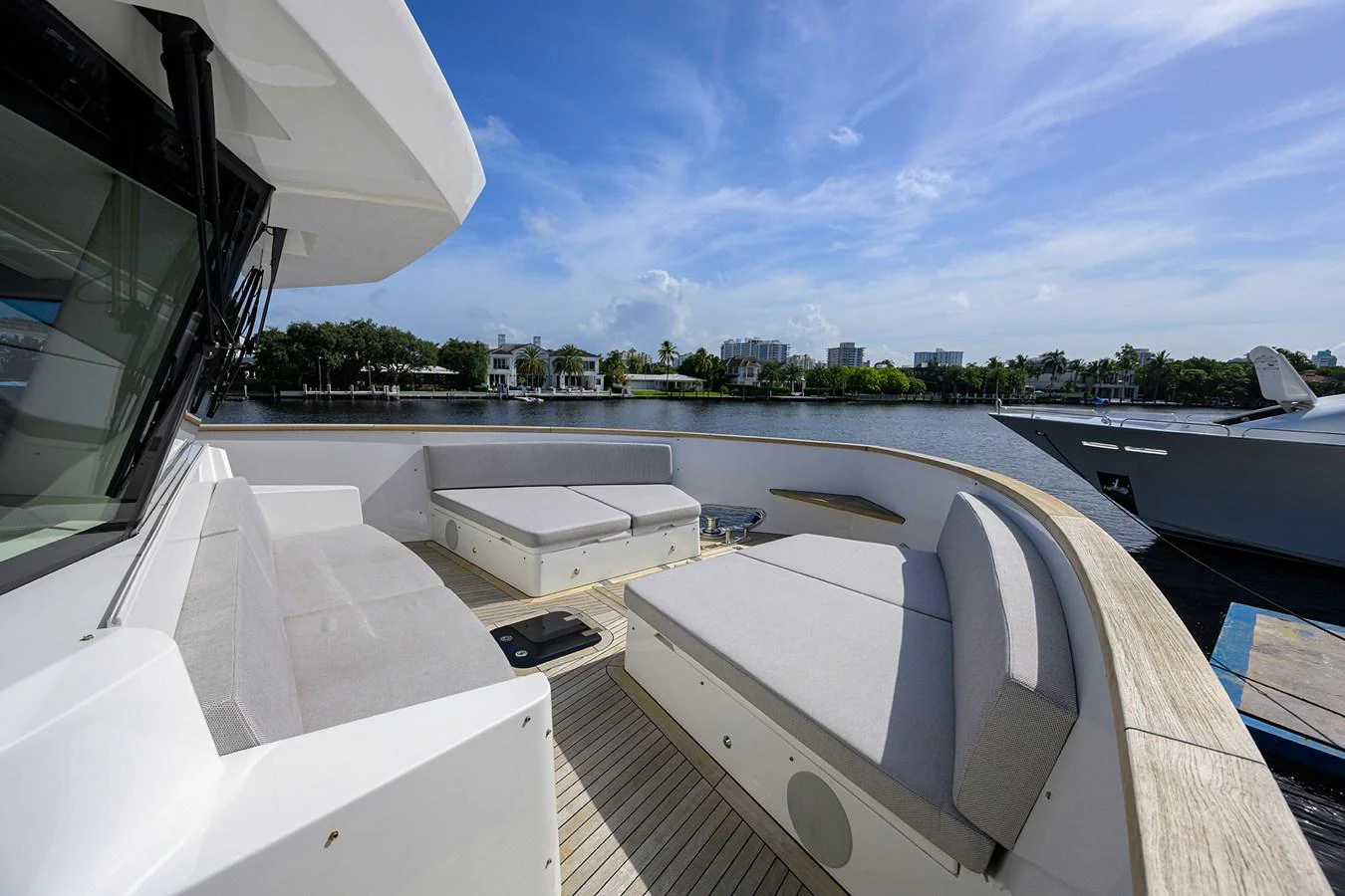 a deck with a view of a city and water aboard C3 Yacht for Sale