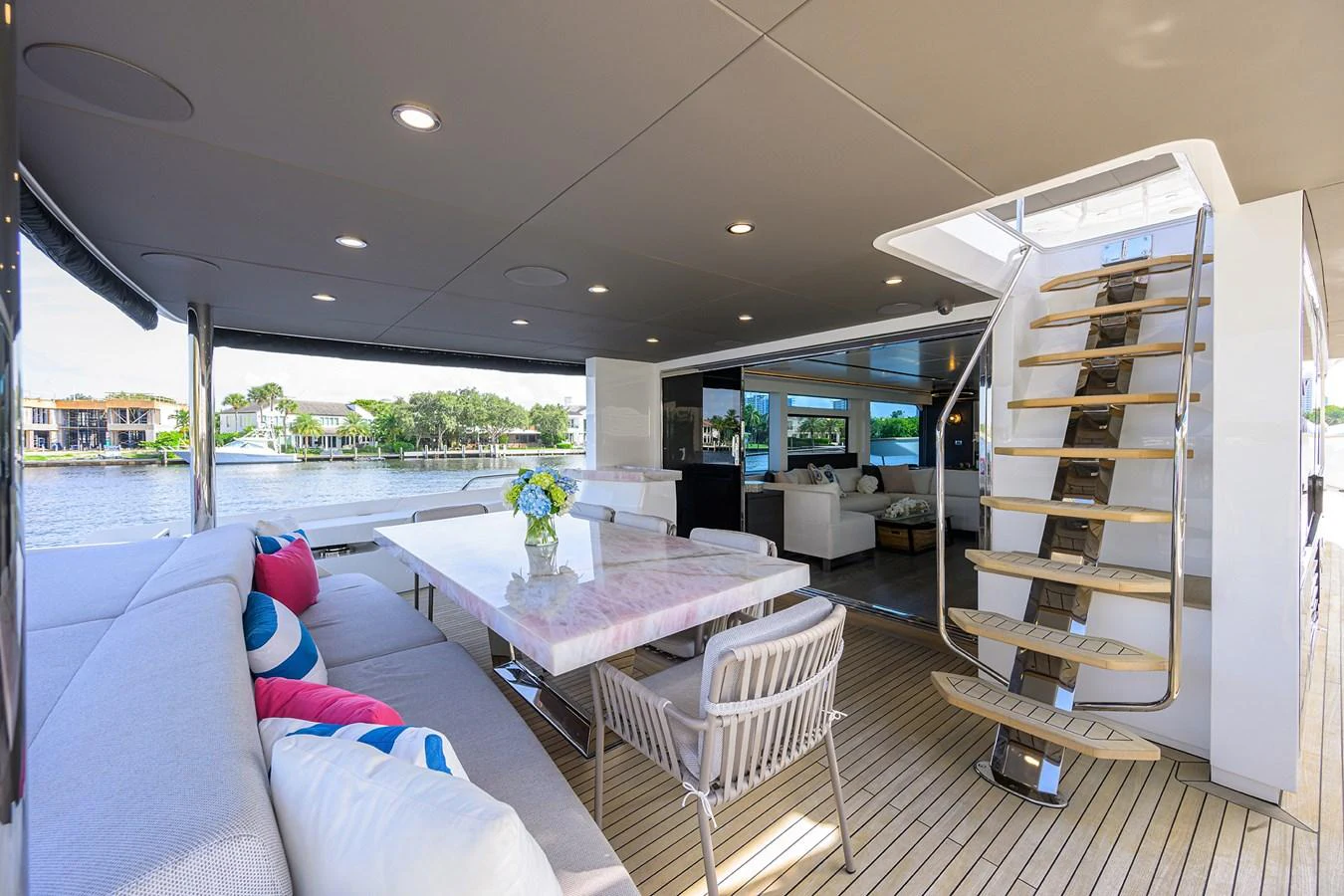 a living room with a large window aboard C3 Yacht for Sale