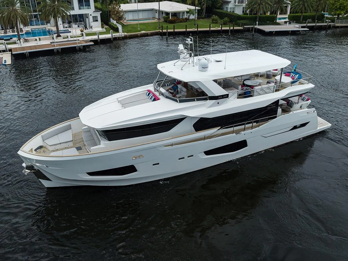 a white boat on the water aboard C3 Yacht for Sale