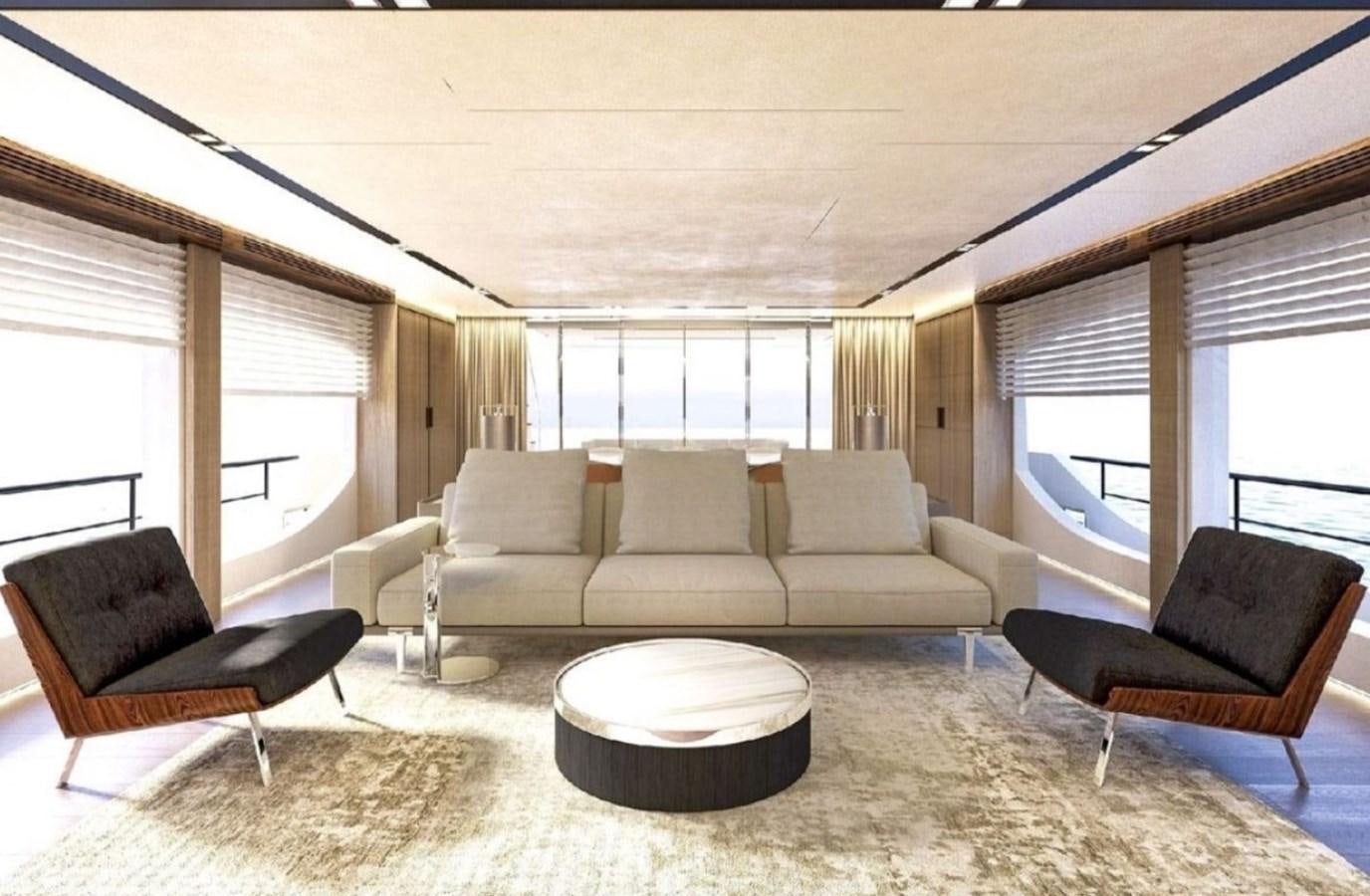 a living room with a couch and a table aboard EDEN Yacht for Sale
