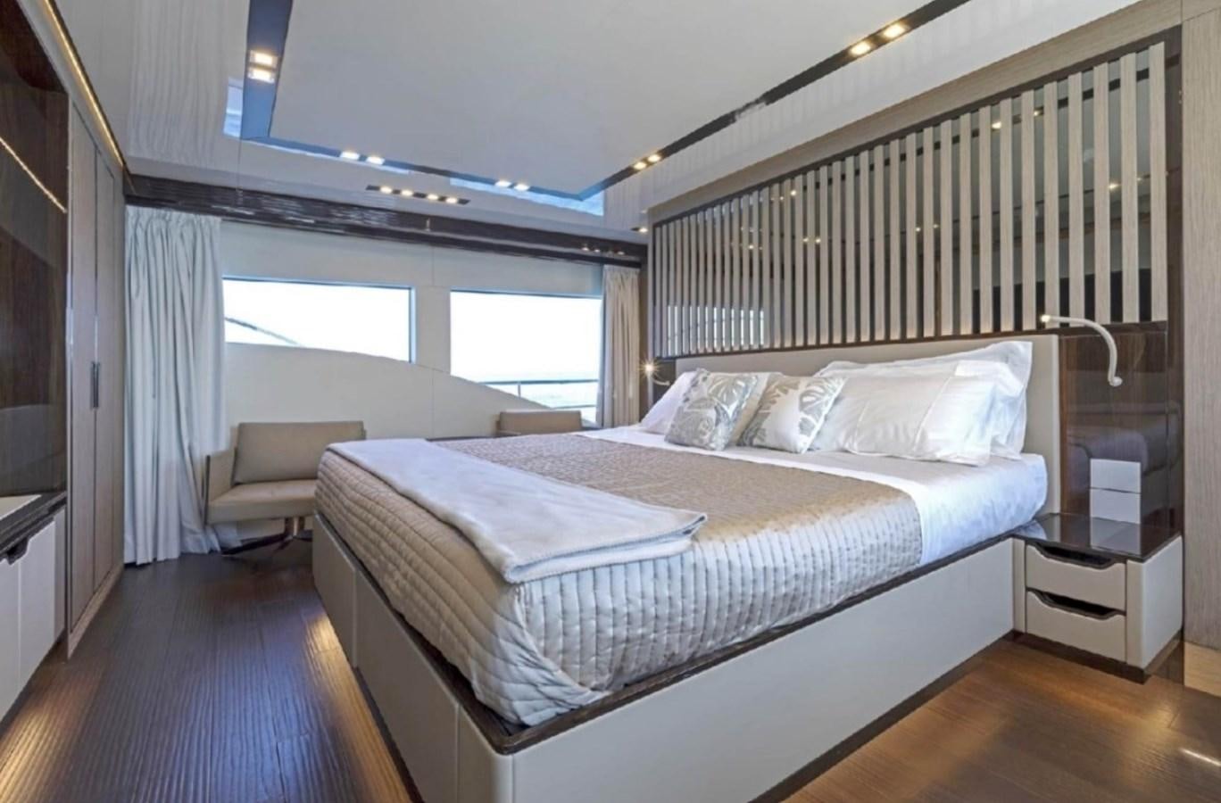 a bed in a room aboard EDEN Yacht for Sale