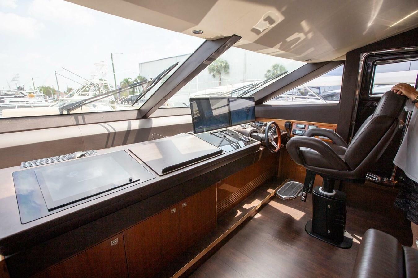 inside of a car aboard ENTOURAGE Yacht for Sale